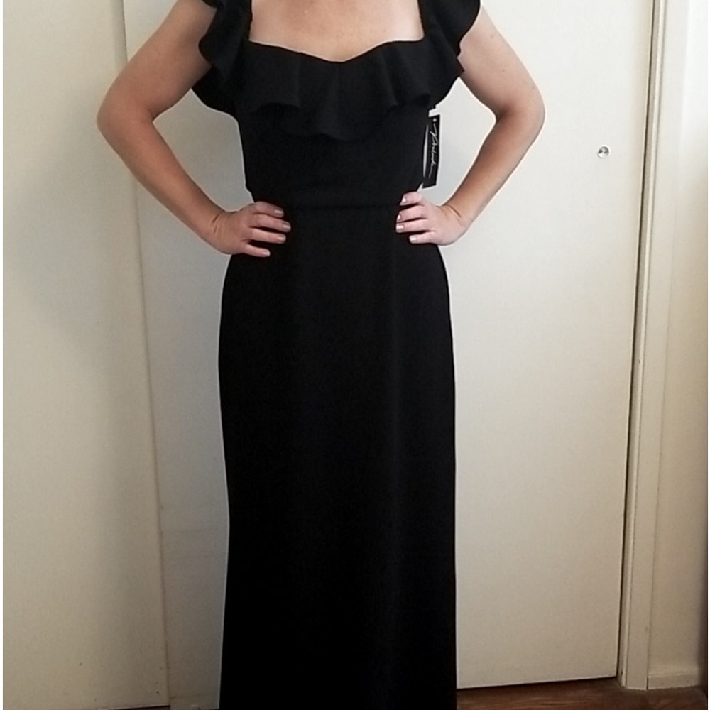 Beautiful Black Gown. Elegant, ruffled neckline.